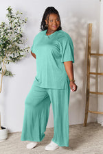 Load image into Gallery viewer, Double Take Full Size Round Neck Slit Top and Pants Set
